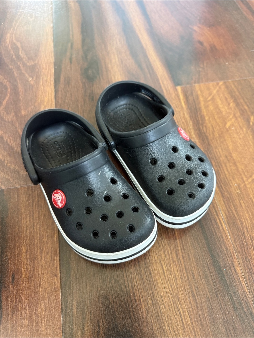 CROCS Kids Black Clog with White Trim and Red Logo